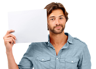 Image showing Mockup, studio portrait and man with poster, placard or billboard for marketing, advertising or product placement. Paper sign, banner space and sales model with promotion mock up on white background