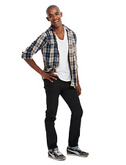 Image showing Portrait, body language and confidence with a black man in studio on a white background to promote trendy clothes. Happy, smile and natural with a casual male posing in casual or contemorary clothing