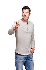 Image showing Thinking, confused and man pointing hand in direction with pondering, shocked and surprise expression. Caucasian model thoughtful and pointing to distance with wow look at isolated white background