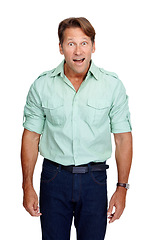 Image showing Shock, surprise and portrait of a man in a studio with a omg, wow and wtf facial expression. Shocked, surprised and happy male model in a casual outfit with good news isolated by a white background.