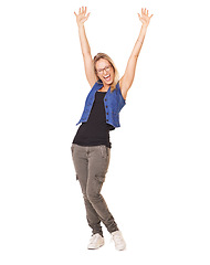 Image showing Winner, wow and a woman arms raised in celebration in studio on a white background for success or achievement. Freedom, goal and target with a young female celebrating reaching goals or glory