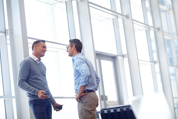 Image showing Airport, lounge and partner communication of business people talking, networking and chat about airplane journey. Conversation, discussion or corporate employee, worker or agent speaking about travel