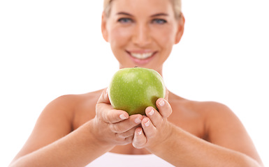 Image showing Apple, health and portrait of woman show fruit product to lose weight, diet or body detox for wellness lifestyle. Healthcare model, nutritionist food and healthy vegan girl on white background studio