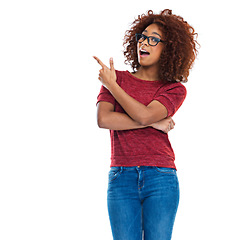 Image showing Black woman, pointing finger and studio with wow, beauty or casual clothes by white background. Woman, happy isolated model and hand sign for fashion, jeans and glasses on face for surprise with afro