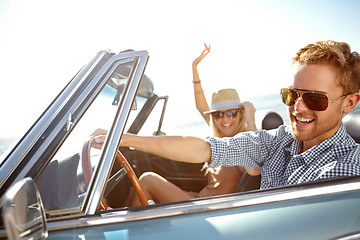 Image showing Car road trip, happy travel and couple on bonding holiday adventure, transportation journey or fun summer vacation. Love flare, convertible automobile and driver driving on Canada countryside tour