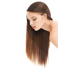 Image showing Beauty, hair care and young woman in studio with a cosmetic, long and shiny hair style. Wellness, natural treatment and female model with brunette hair isolated by white background with mockup space.