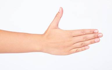 Image showing Woman, handshake or hello on studio background in greeting success, strategy collaboration or welcome support. Zoom, model or shaking hands gesture in partnership meeting, goals motivation or mockup