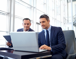 Image showing Corporate, laptop and business people in lobby meeting, collaboration or strategy planning on global marketing. Professional businessman, client or partner reading online review for company portfolio