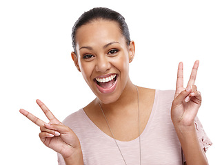 Image showing Peace sign, smile and portrait of woman on a white background for happy, relaxing and positive mindset. Beauty, emoji and face of girl isolated in studio with hand gesture for calm, wellness and zen