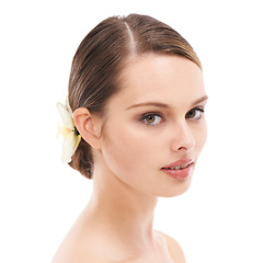 Image showing Beauty, hair and portrait of woman with flower in hair style and elegant make up on white background. Health, wellness and luxury cosmetic skincare, hair care and headshot of beautiful studio model.