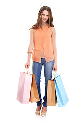 Image showing Woman, retail portrait and shopping packaging in studio for fashion market, designer girl vision and luxury boutique brand. Customer, clothing product or shopping bag in white background in studio