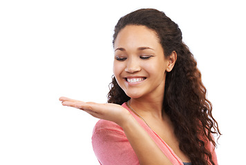 Image showing Beautiful, young woman and smile with hand out for marketing, advertising or product against white studio background. Happy isolated female model posing with palm for advertisement or brand on mockup