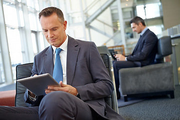 Image showing Hotel, tablet and networking with businessman in lounge of corporate company for search, internet and contact. Communication, planning and idea with men in lobby for technology, goal and email