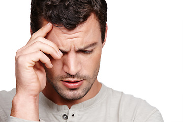 Image showing Man, headache and stress face in studio for depression, mental health and burnout anxiety in white background. Person, head pain and hands frustrated, worried or tired closed eyes isolated in studio