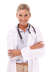 Image showing Portrait, doctor and woman with arms crossed in studio isolated on a white background. Face, healthcare wellness and smile of happy, confident and proud female medical worker or physician from Canada