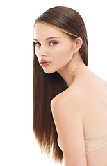 Image showing Portrait, hair and beauty with a model woman in studio on a white background for keratin or natural treatment. Face, haircare and cosmetics with a beautiful young female posing to promote wellness