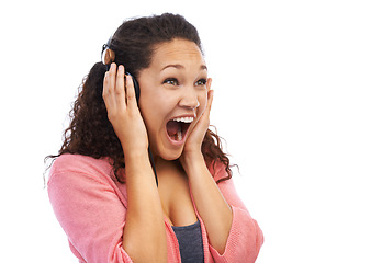 Image showing Woman, wow face and excited for music, headphones and studio background. Happy, crazy and surprise girl listening to audio, podcast and radio of amazing entertainment announcement on white background