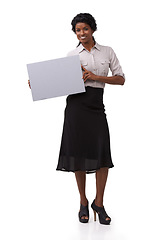 Image showing Portrait, poster and mockup with an indian woman in studio on a white background holding a blank sign. Marketing, advertisng and mock up on paper with a female showing space for product placement