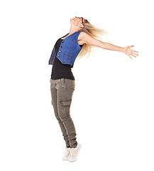 Image showing Freedom, carefree and a woman model standing arms outstretched in studio on a white background feeling free. Motivation, wellness and peace with a young female posing for stress free liberation