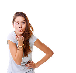 Image showing Blowing kiss, happy and woman thinking of mockup space for motivation, marketing and care. Happiness, friendly and model with love, flirty body language and fun on a white background in studio