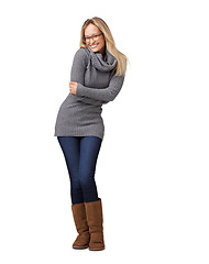 Image showing Fashion, cozy and portrait of a woman with winter clothing, feminine style and comfy. Stylish, classy and full body happy clothes model with a comfortable outfit on a white background in studio