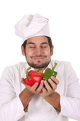 Image showing chef smelling the aroma of peppers