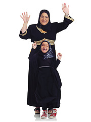 Image showing Portrait, children or muslim with a mother and daughter in studio isolated on a white background together as a family. Eid, love or islam with a woman and girl bonding on blank space for religion