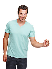 Image showing Portrait, man and fist for achievement, excited and young male isolated on white studio background. Guy, gentleman and gesture for success, winner and celebration with happiness, motivation or energy