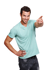 Image showing Man, happy portrait and pointing finger in studio for advertising, marketing mockup and product suggestion isolated white background. Handsome male, confident smile and point hands for choice