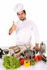 Image showing young chef preparing lunch