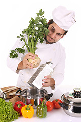Image showing young chef preparing lunch