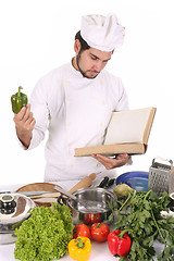 Image showing young chef preparing lunch