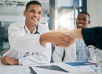 Image showing Doctor, handshake and meeting with patient, smile and greeting for vaccination education, talk or help. Black man, doctors and shaking hands with client for wellness, healthcare or medicine in clinic