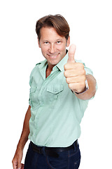 Image showing Man, studio portrait and thumbs up with smile, casual fashion and yes by white background with happiness. Happy middle aged man, hand sign and agreement with success, isolated or confident with shirt