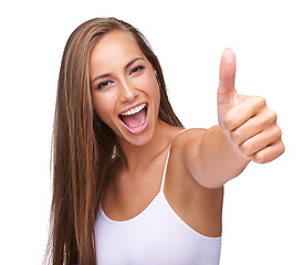 Image showing Thumbs up, winner and portrait of a woman with yes isolated on a studio background. Success, smile and model with a hand emoji sign for agreement, win and goal on a white background in studio