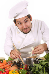 Image showing young chef preparing lunch