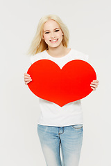 Image showing Red heart, love and portrait of woman in studio for peace, self love and affection on white background. Shape, emoji and face of girl holding cardboard sign, loving and gesture with mockup space