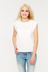 Image showing Fashion, smile and portrait of a model in studio with a cosmetic, makeup or natural face routine. Beauty, cosmetics and young woman from Australia with a casual outfit or clothes by white background.