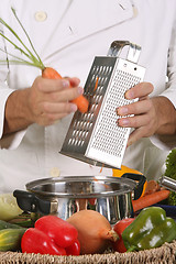 Image showing cutting carrot 