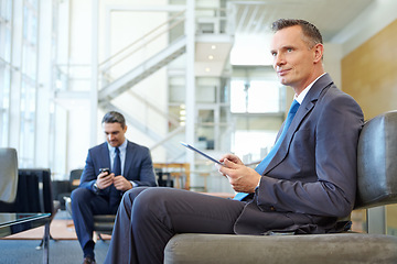 Image showing Travel, tablet and relax with businessman in airport lobby for networking, email and communication. Planning, contact and goal with ceo in lounge on layover for business class, leadership and app