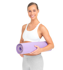 Image showing Woman, studio portrait and holding yoga mat with smile, happiness and white background for exercise. Isolated model, yoga or pilates training with mindfulness, health and fitness for strong body