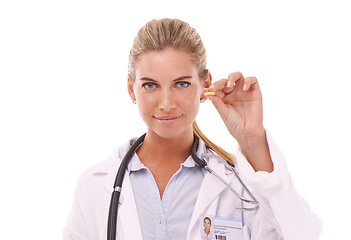 Image showing Portrait of pharmacist and hand holding pills on a white background for medicine, product or pharmacy. Doctor with smile on her face for healthcare drugs or supplements in studio mockup for brand