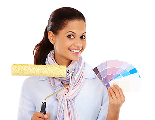 Image showing Woman, smile and paint brush with swatches for color choice or decision against white studio background. Portrait of isolated female holding roller with pastel colors for painting on white background