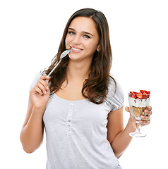 Image showing Woman, portrait and eating dessert food in studio with strawberry fruit and yogurt for breakfast or healthy snack. Face of a female model isolated on a white background for nutrion, diet and wellness