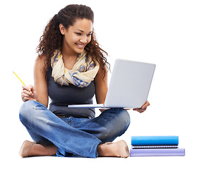 Image showing Student, laptop and smile learning with books or studying in studio for university education, knowledge and internet research. Young black woman, planning or reading college notes on tech device