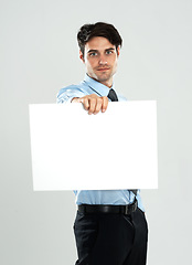 Image showing Placard mockup, presentation and portrait businessman with marketing promo poster, advertising banner or product placement. Mock up, billboard sign and studio sales model isolated on white background