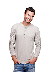 Image showing Portrait, fashion and cool with a man model in studio isolated on a white background looking happy. Smile, casual and modern with a handsome male posing in contemporary clothes for trendy style