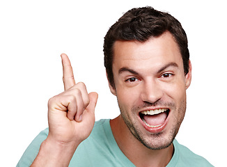 Image showing Portrait, excited and mockup with a man in studio isolated on a white background for marketing or advertising. Face, pointing and mock up with a happy male posing on blank product placement space