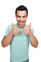 Image showing Portrait, thumbs up and review with a man in studio isolated on a white background as a winner or for motivation. Thank you, goal and target with an excited man showing a positive hand sign or emoji