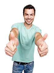 Image showing Portrait, thumbs up and motivation with a man in studio isolated on a white background showing an emoji as a winner. Thank you, goal or target with an excited man giving a positive hand sign